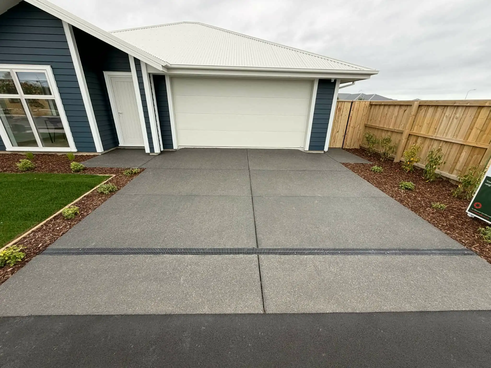 Exposed aggregate concrete finish with Canterbury river stone